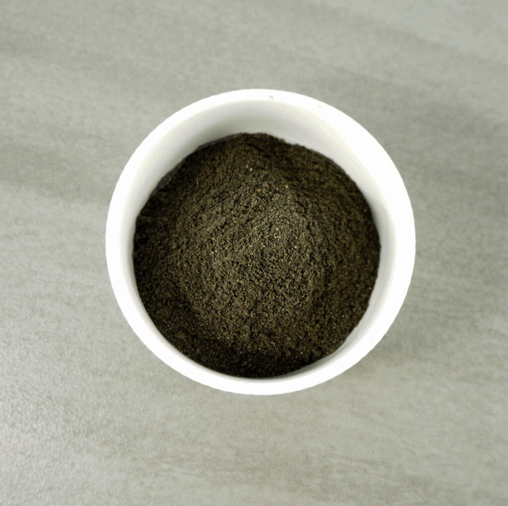 black cumin, nigella sativa, powder in a bowl