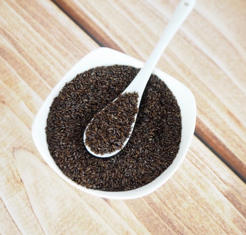 Psyllium, Plantago psyllium, seeds in a bowl with a spoon